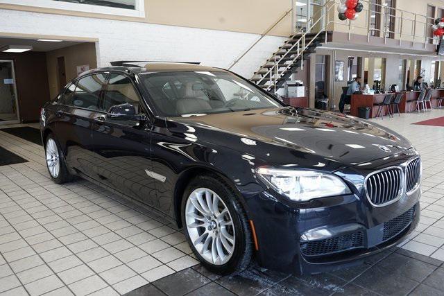 used 2014 BMW 750 car, priced at $15,555