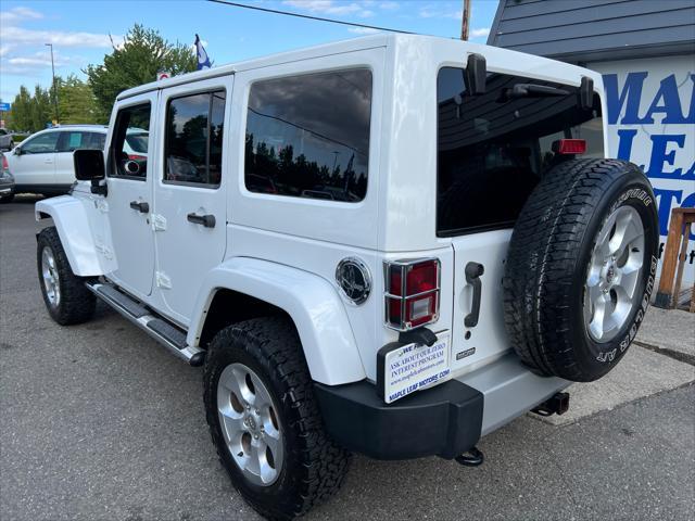 used 2013 Jeep Wrangler Unlimited car, priced at $13,999