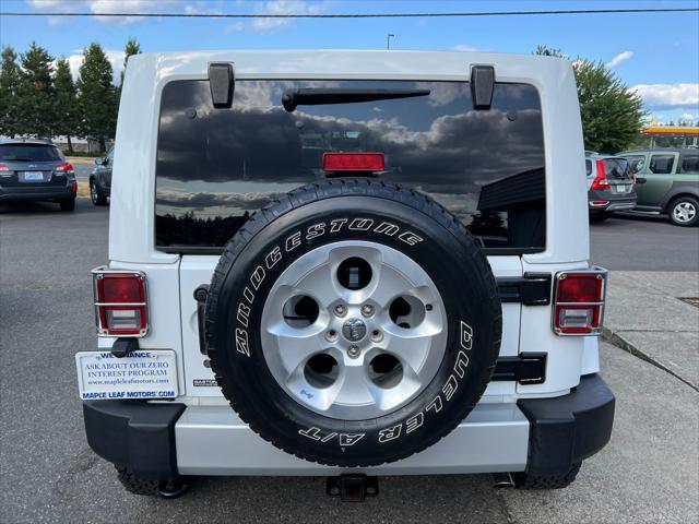 used 2013 Jeep Wrangler Unlimited car, priced at $13,999