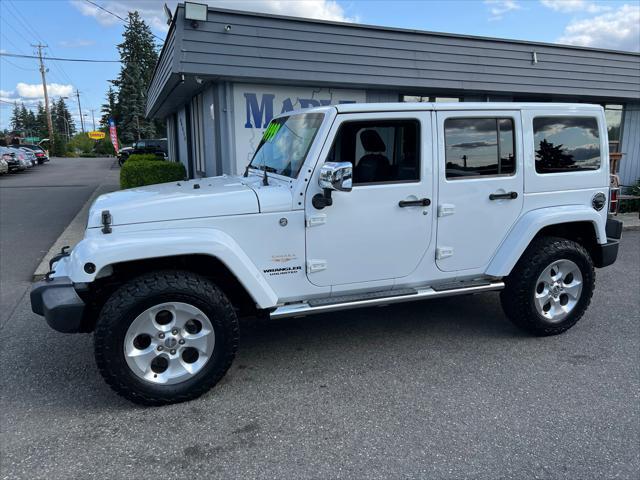 used 2013 Jeep Wrangler Unlimited car, priced at $13,999