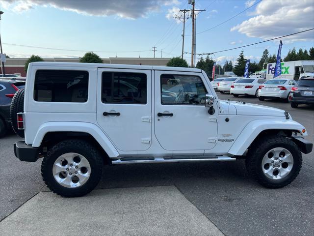 used 2013 Jeep Wrangler Unlimited car, priced at $13,999