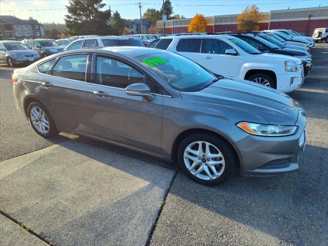 used 2014 Ford Fusion car, priced at $7,999