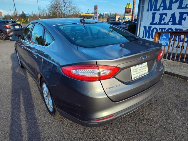 used 2014 Ford Fusion car, priced at $7,999