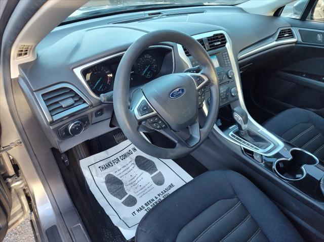 used 2014 Ford Fusion car, priced at $7,999