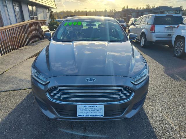 used 2014 Ford Fusion car, priced at $7,999