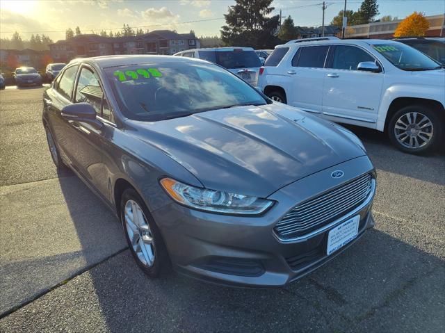 used 2014 Ford Fusion car, priced at $7,999