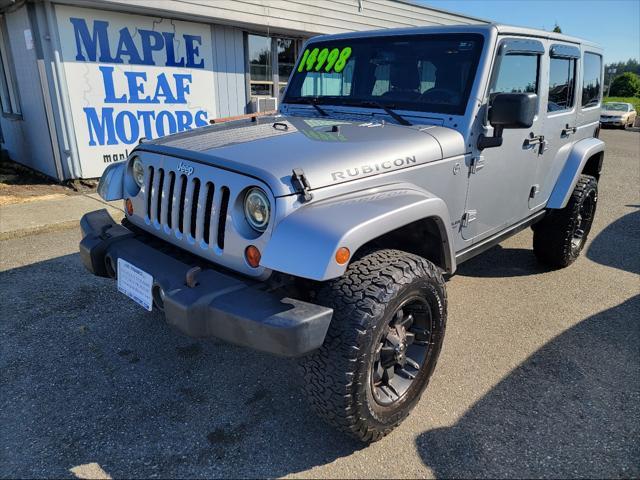 used 2013 Jeep Wrangler Unlimited car, priced at $13,499