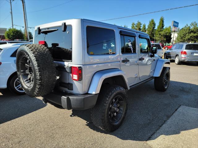 used 2013 Jeep Wrangler Unlimited car, priced at $13,499