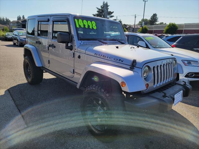 used 2013 Jeep Wrangler Unlimited car, priced at $13,499