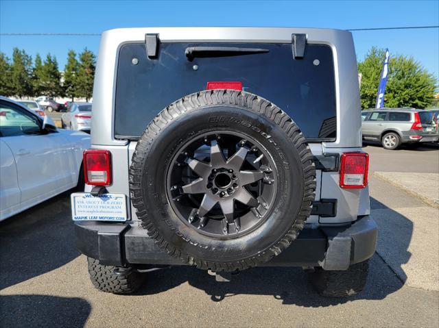 used 2013 Jeep Wrangler Unlimited car, priced at $13,499