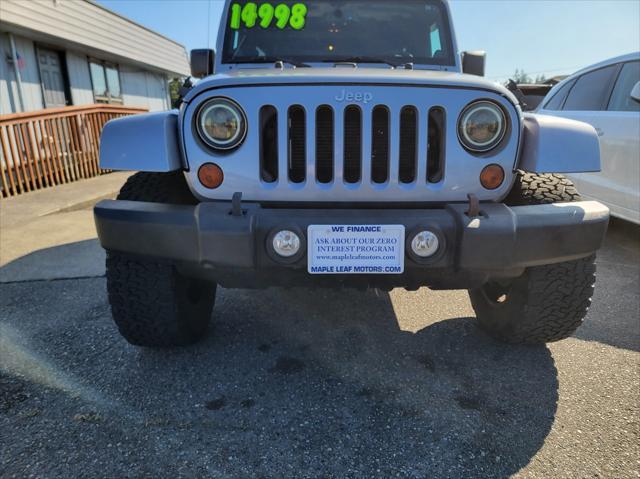 used 2013 Jeep Wrangler Unlimited car, priced at $13,499