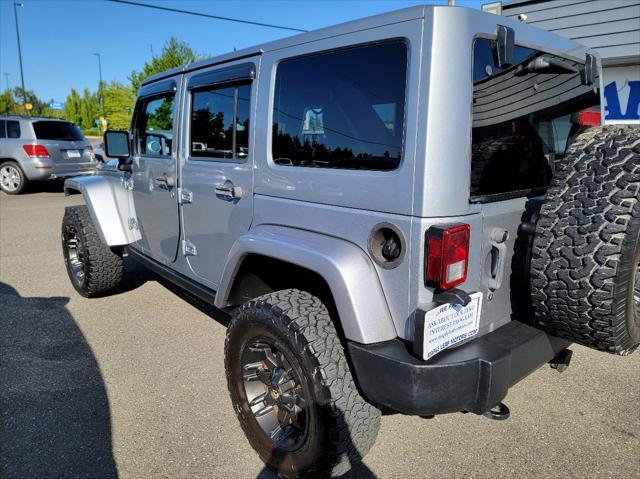 used 2013 Jeep Wrangler Unlimited car, priced at $13,499