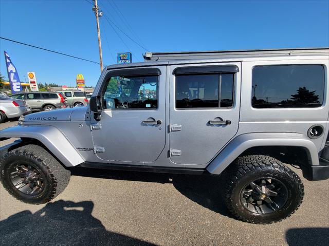 used 2013 Jeep Wrangler Unlimited car, priced at $13,499