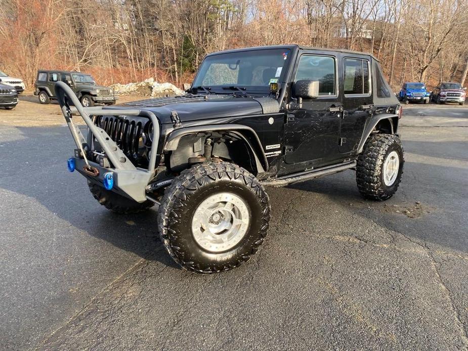 used 2018 Jeep Wrangler JK Unlimited car, priced at $22,480