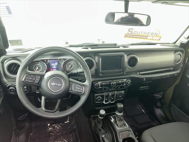 used 2023 Jeep Wrangler car, priced at $29,636