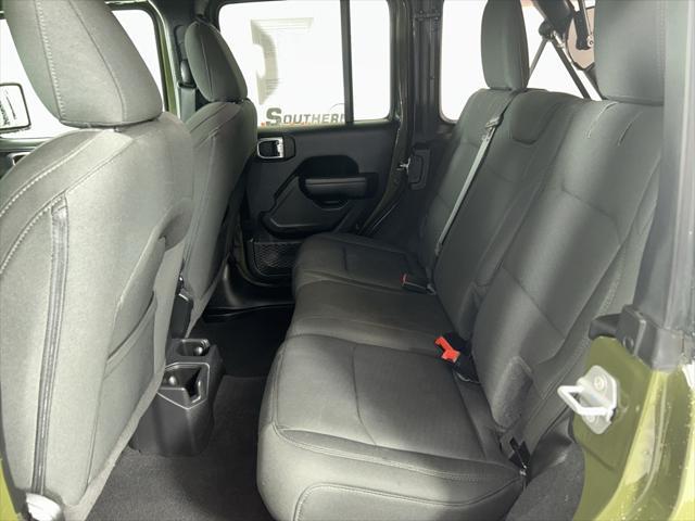 used 2023 Jeep Wrangler car, priced at $29,636