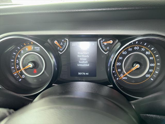 used 2023 Jeep Wrangler car, priced at $29,636