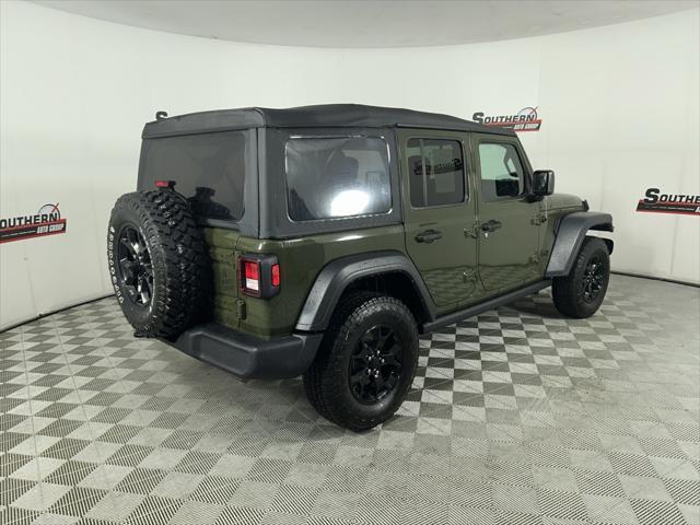 used 2023 Jeep Wrangler car, priced at $29,636