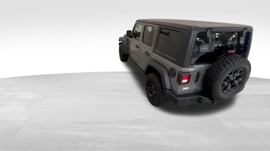 used 2022 Jeep Wrangler Unlimited car, priced at $28,497
