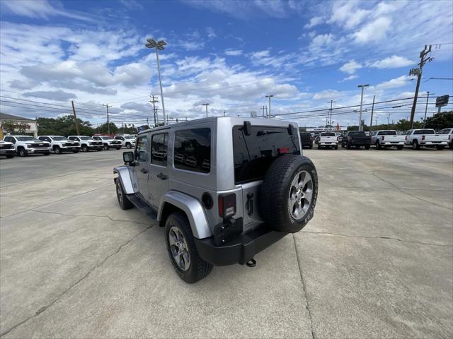 used 2016 Jeep Wrangler Unlimited car, priced at $17,990