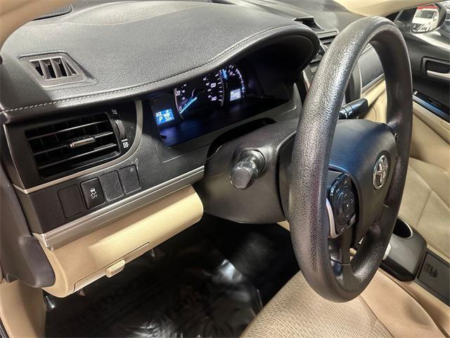 used 2014 Toyota Camry car, priced at $14,000