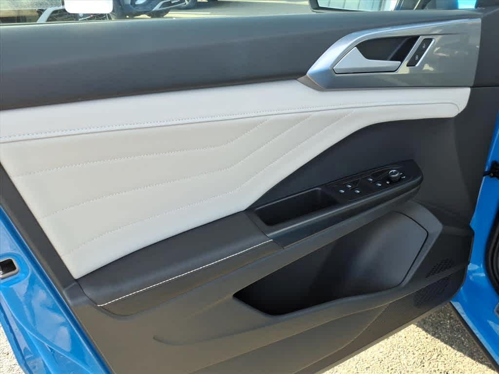 used 2025 Volkswagen Taos car, priced at $33,993