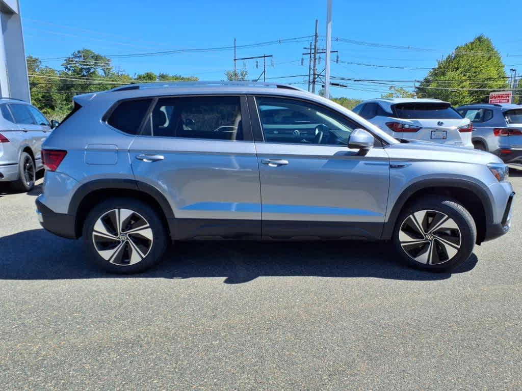 used 2023 Volkswagen Taos car, priced at $24,688