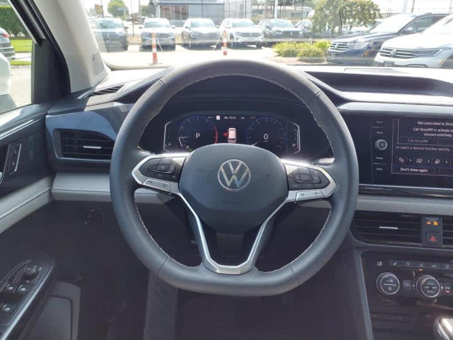 used 2023 Volkswagen Taos car, priced at $28,998