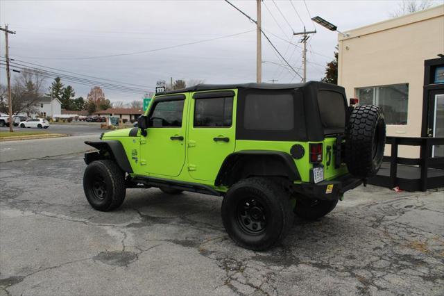 used 2013 Jeep Wrangler Unlimited car, priced at $12,995