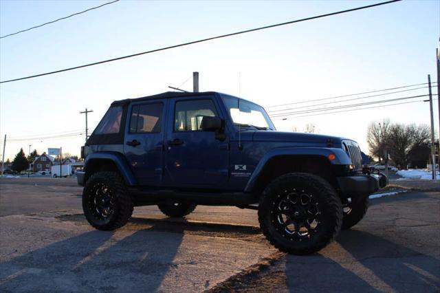 used 2009 Jeep Wrangler Unlimited car, priced at $10,995