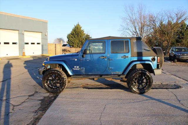 used 2009 Jeep Wrangler Unlimited car, priced at $10,995