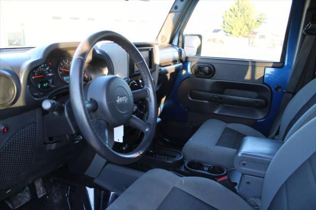 used 2009 Jeep Wrangler Unlimited car, priced at $10,995