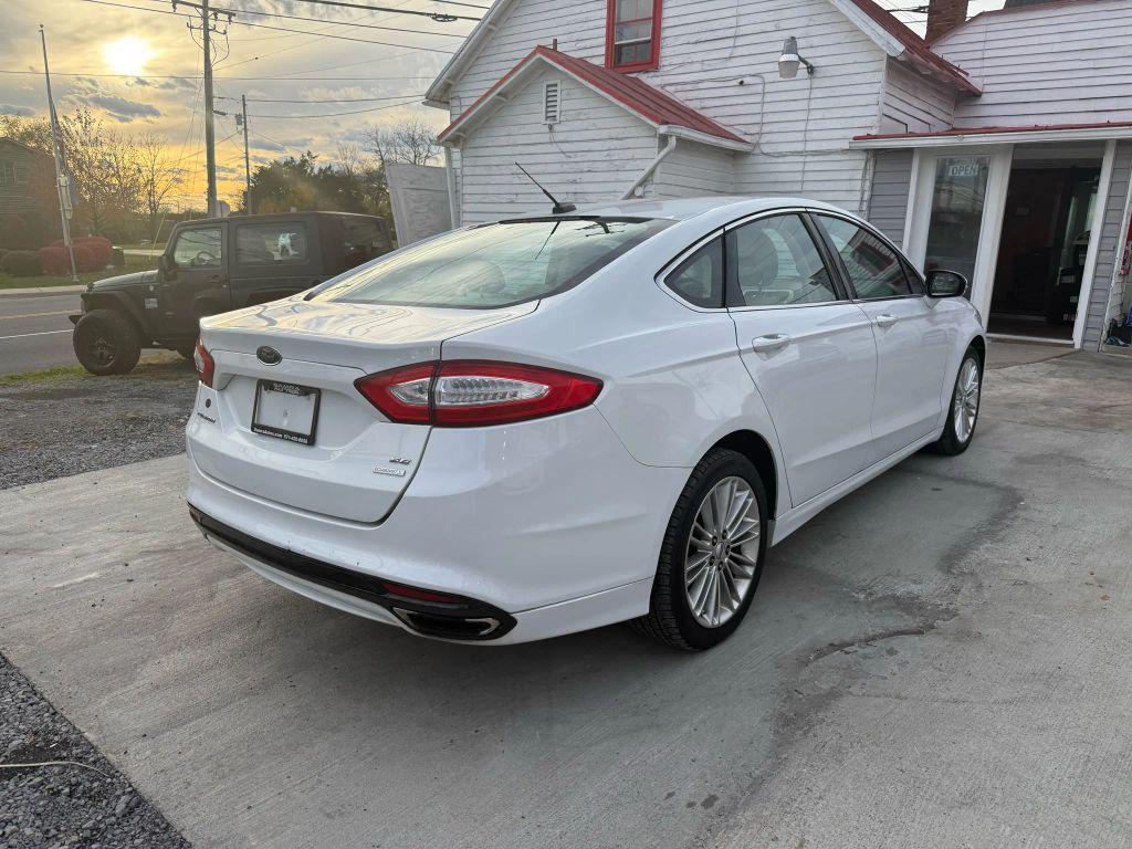 used 2014 Ford Fusion car, priced at $5,995