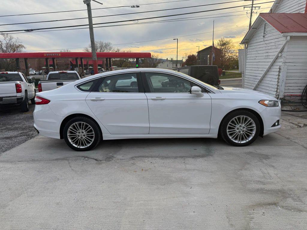 used 2014 Ford Fusion car, priced at $5,995