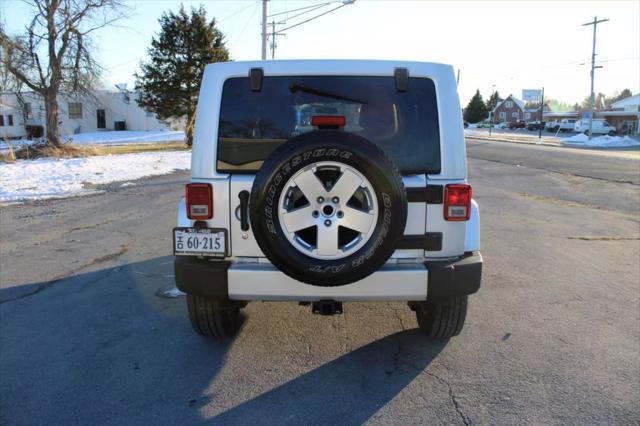 used 2011 Jeep Wrangler Unlimited car, priced at $10,995