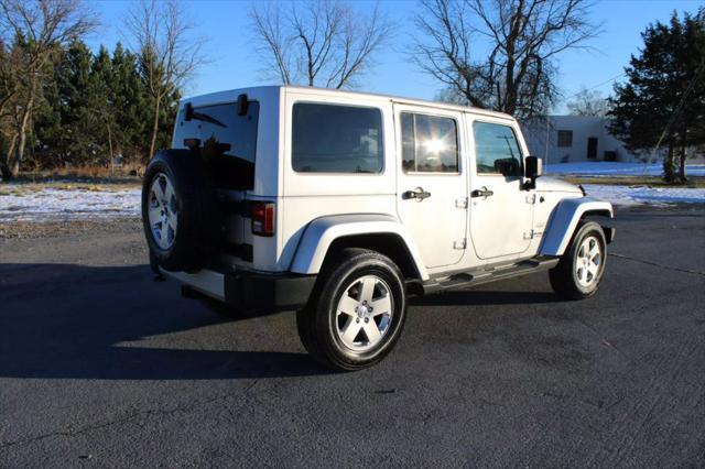 used 2011 Jeep Wrangler Unlimited car, priced at $10,995