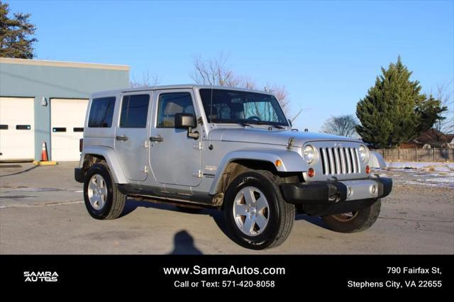 used 2011 Jeep Wrangler Unlimited car, priced at $10,995