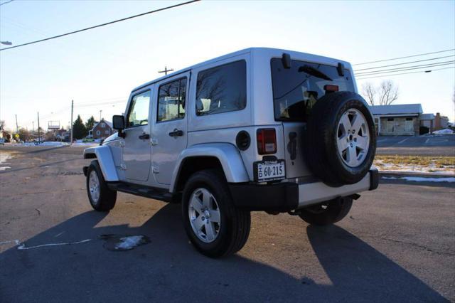 used 2011 Jeep Wrangler Unlimited car, priced at $10,995