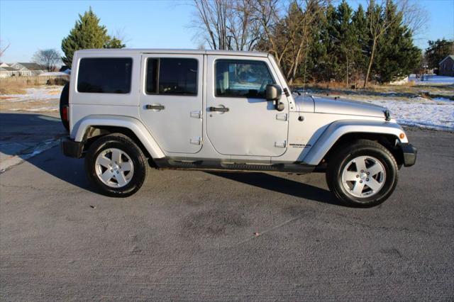 used 2011 Jeep Wrangler Unlimited car, priced at $10,995