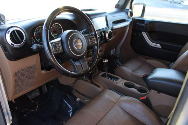 used 2011 Jeep Wrangler Unlimited car, priced at $10,995