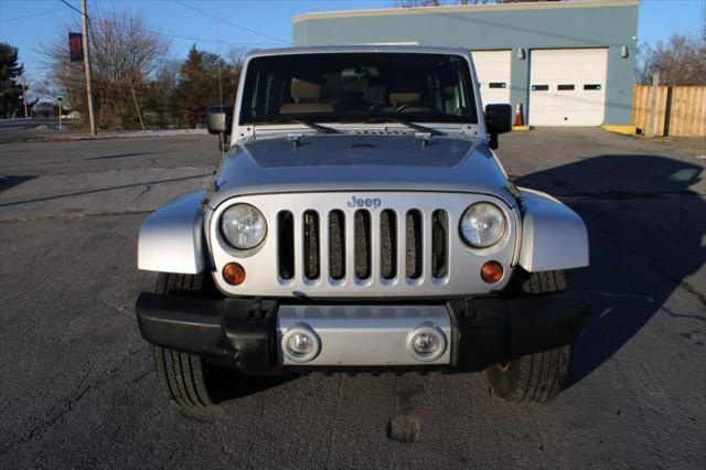 used 2011 Jeep Wrangler Unlimited car, priced at $10,995