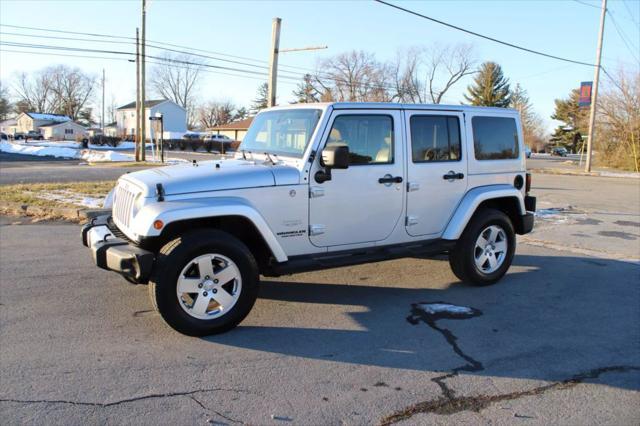 used 2011 Jeep Wrangler Unlimited car, priced at $10,995