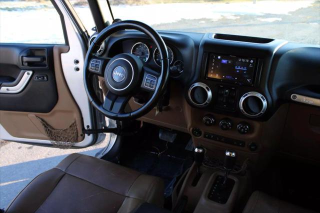 used 2011 Jeep Wrangler Unlimited car, priced at $10,995