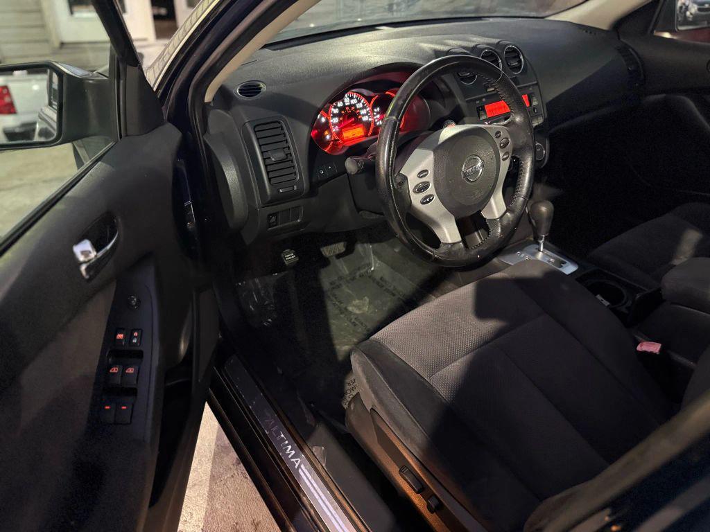 used 2009 Nissan Altima car, priced at $2,995