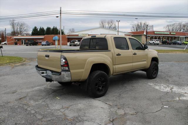 used 2011 Toyota Tacoma car, priced at $13,995