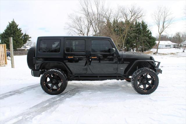 used 2012 Jeep Wrangler Unlimited car, priced at $15,995