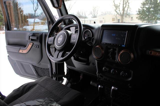 used 2012 Jeep Wrangler Unlimited car, priced at $15,995