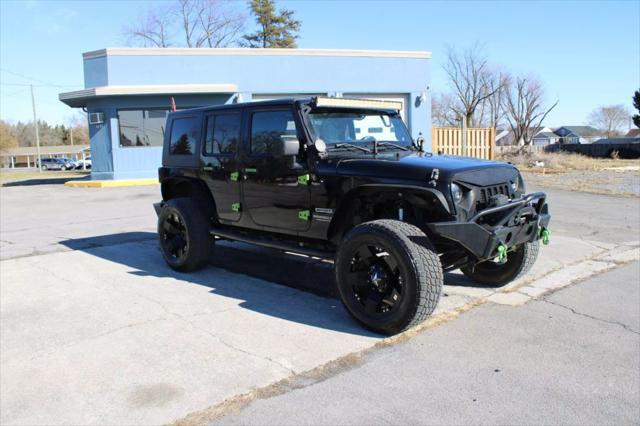 used 2014 Jeep Wrangler Unlimited car, priced at $13,995