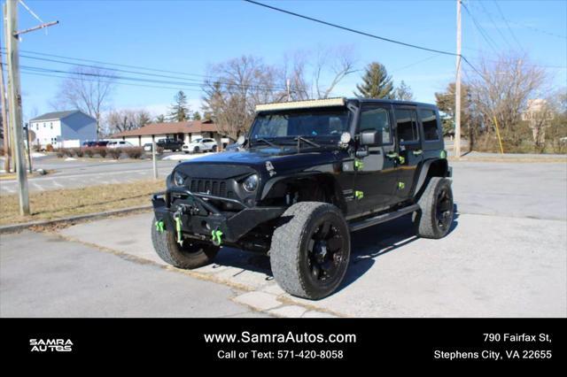 used 2014 Jeep Wrangler Unlimited car, priced at $13,995