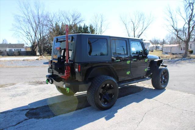 used 2014 Jeep Wrangler Unlimited car, priced at $13,995